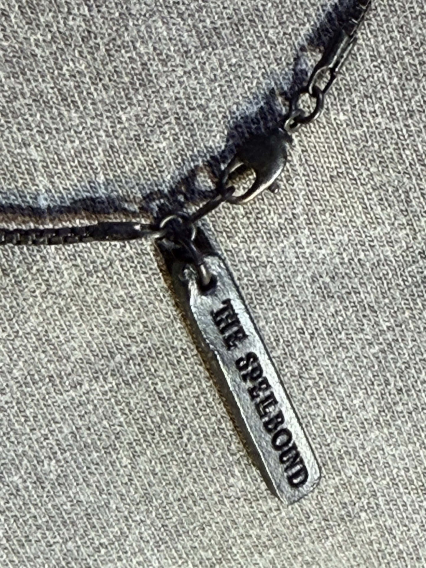 THE SPELLBOUND Metal Logo Necklace Black