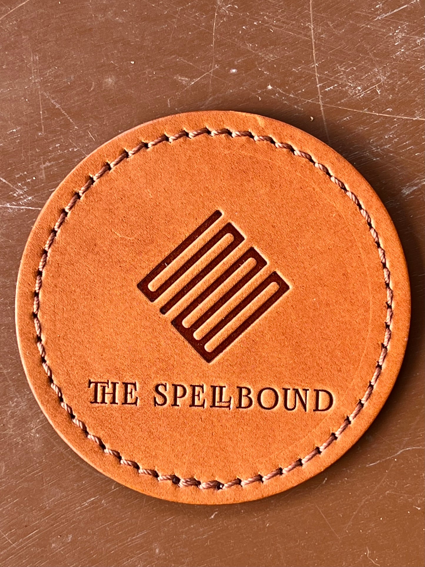 THE SPELLBOUND Original leather coaster