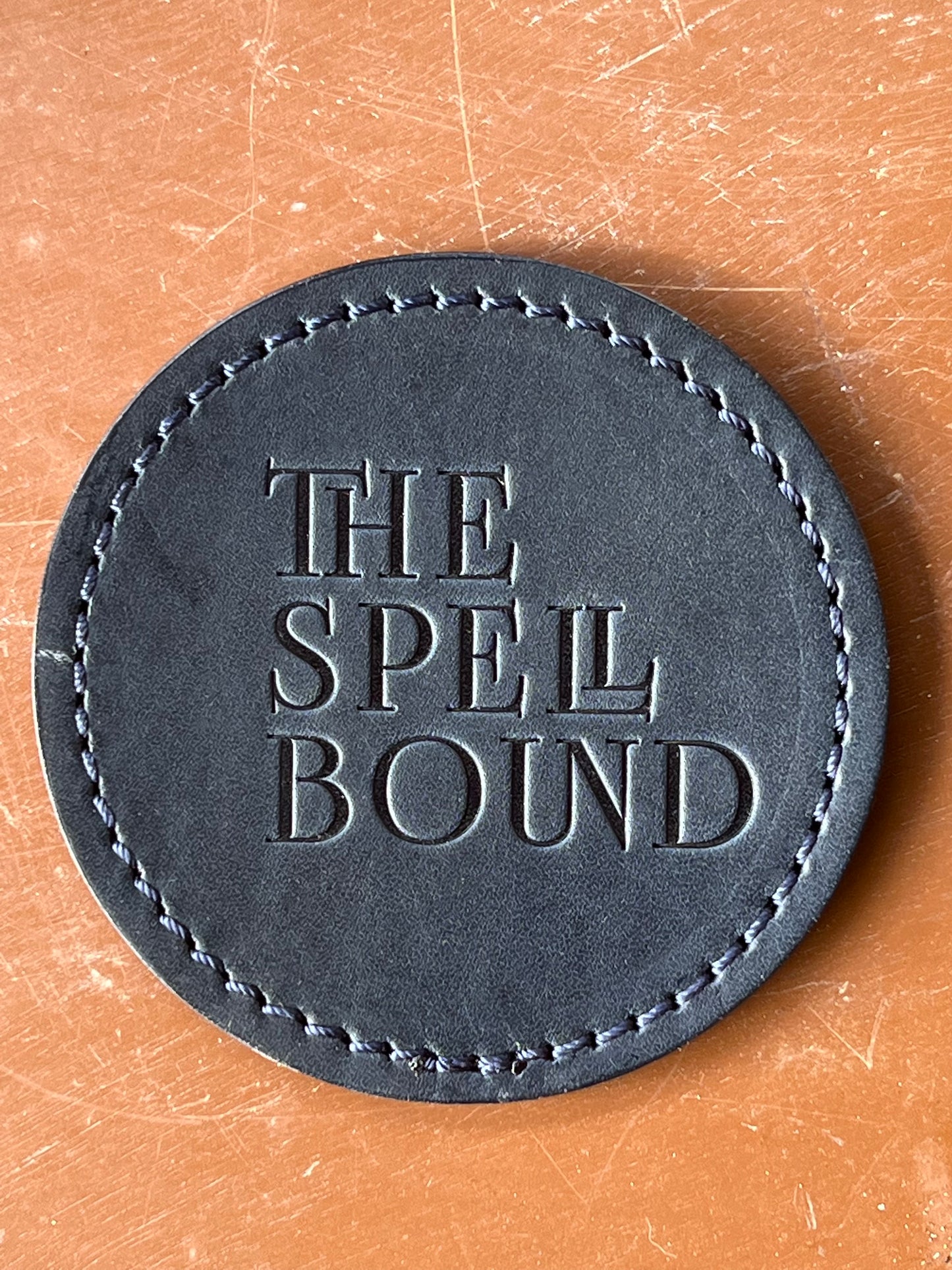 THE SPELLBOUND Original leather coaster