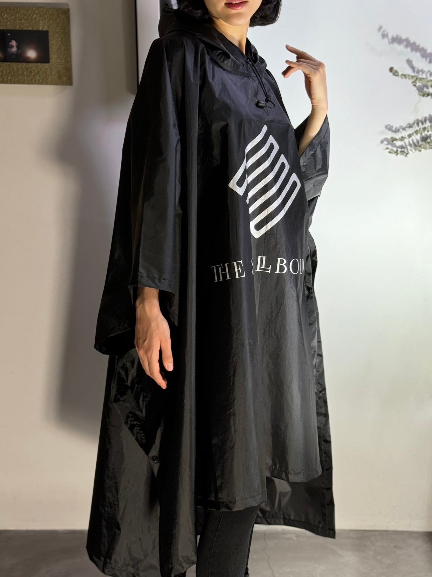 THE SPELLBOUND Rain Poncho