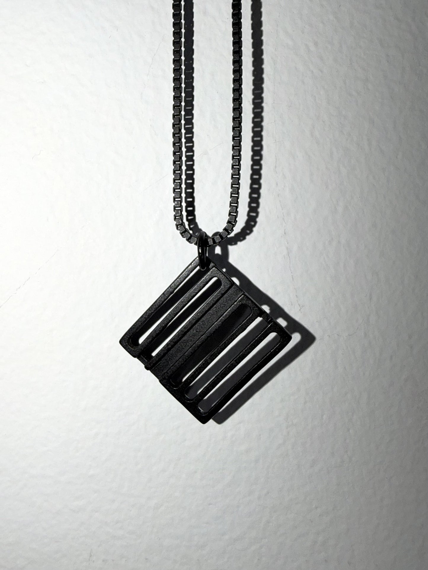 THE SPELLBOUND Metal Logo Necklace Black