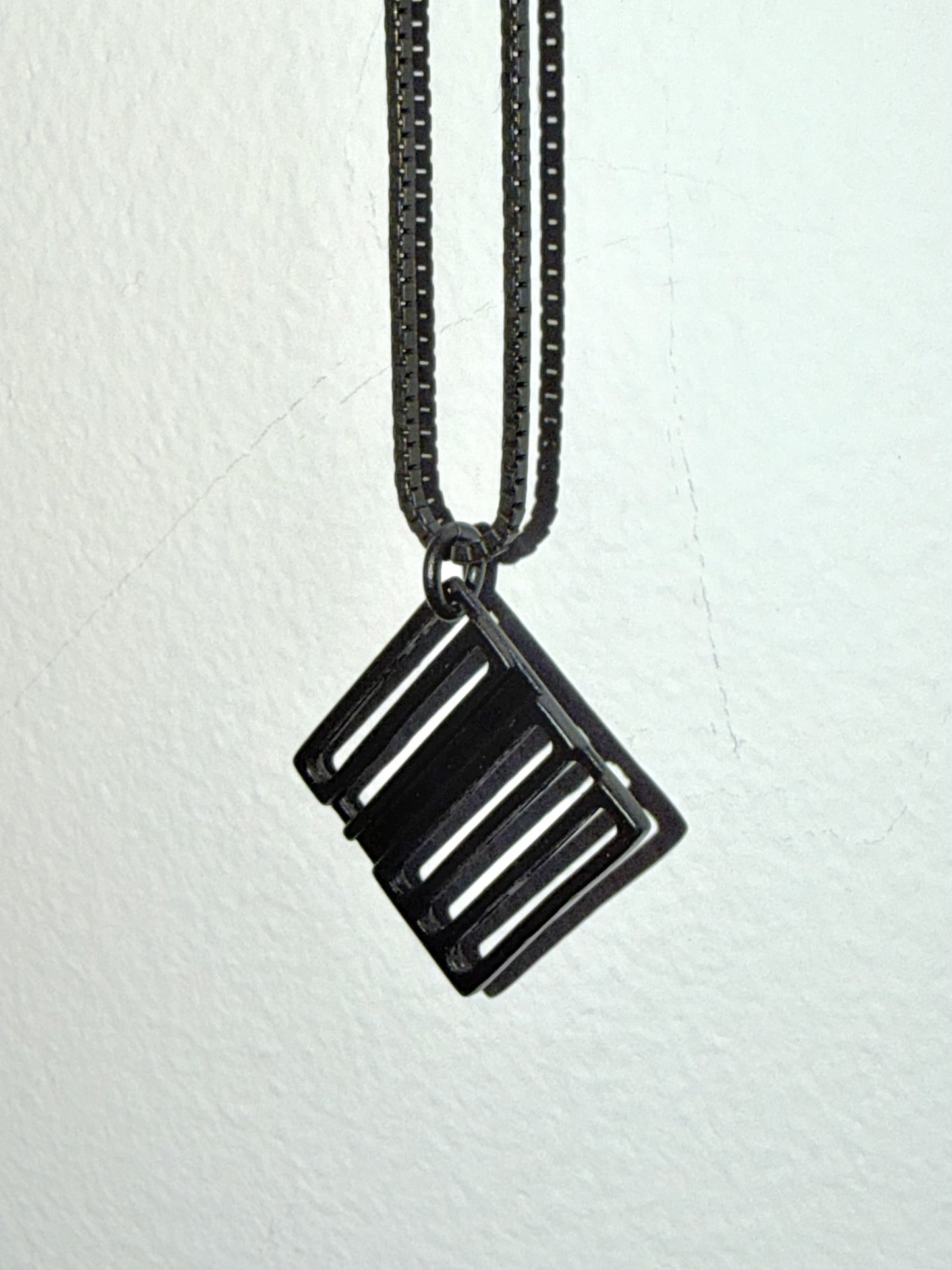 THE SPELLBOUND Metal Logo Necklace Black