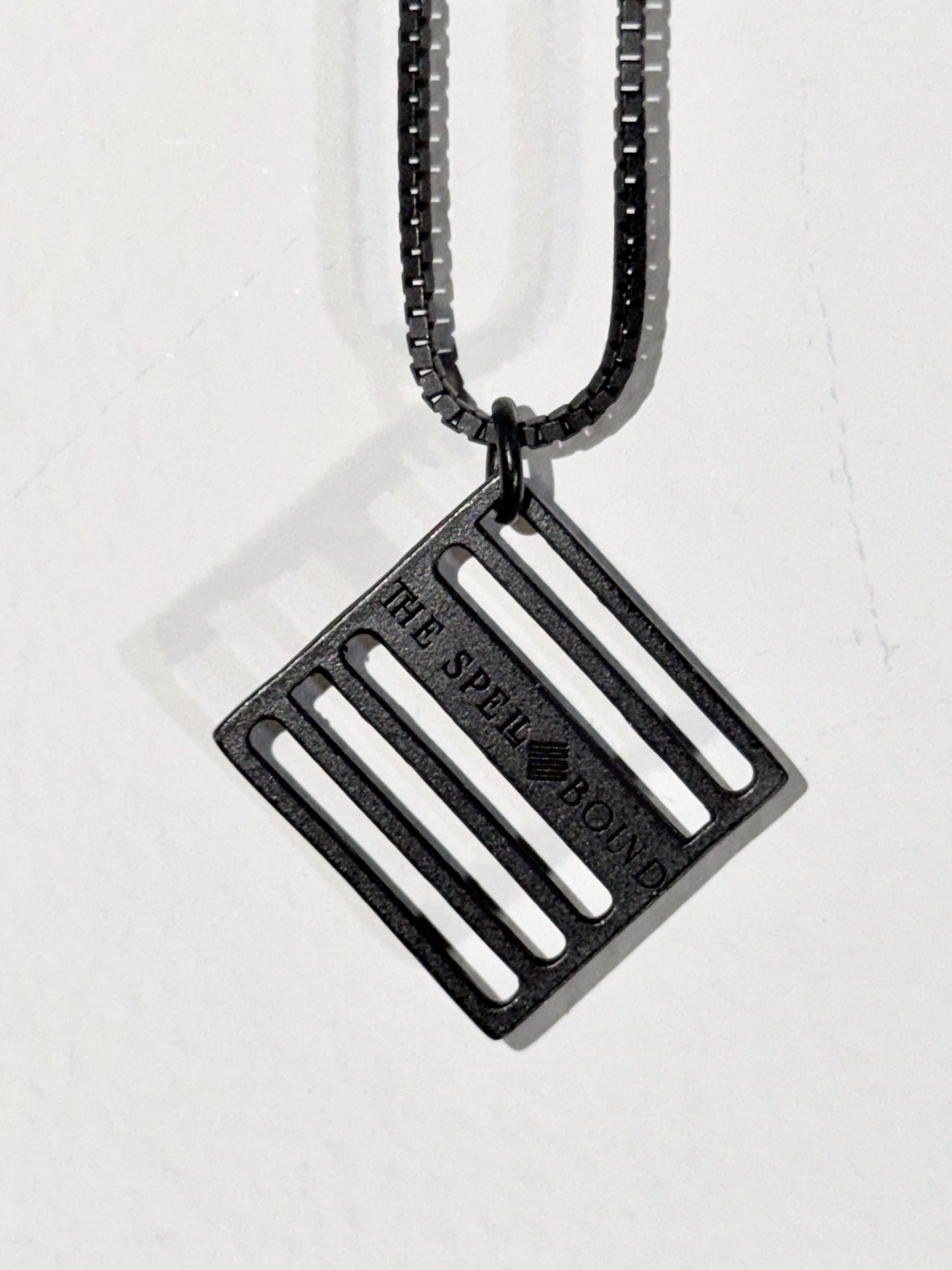 THE SPELLBOUND Metal Logo Necklace Black