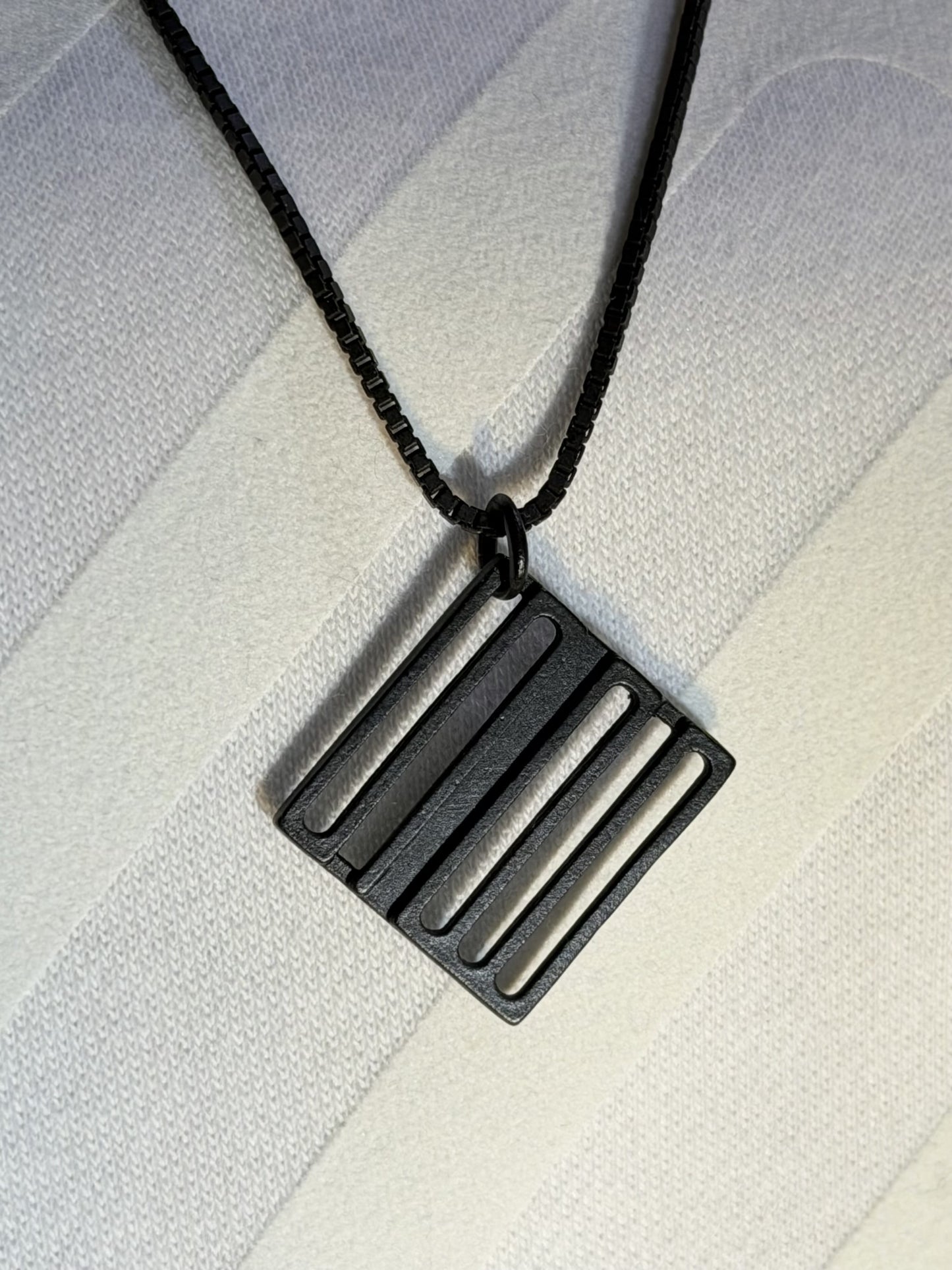 THE SPELLBOUND Metal Logo Necklace Black