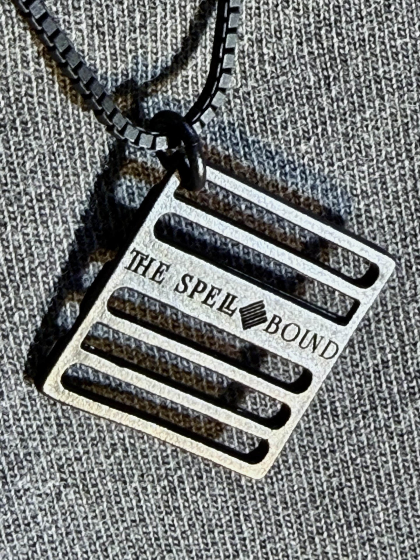 THE SPELLBOUND Metal Logo Necklace Black